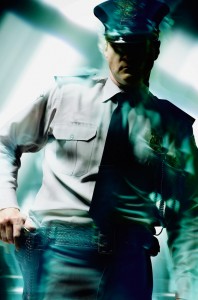 Security Guard Drawing his Weapon